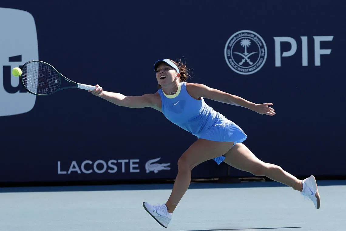 Mar 19, 2024; Miami Gardens, FL, USA; Simona Halep (ROU) reaches for a forehand against Paula Badosa (ESP) (not pictured) on day two of the Miami Open at Hard Rock Stadium. Mandatory Credit: Geoff Burke-USA TODAY Sports