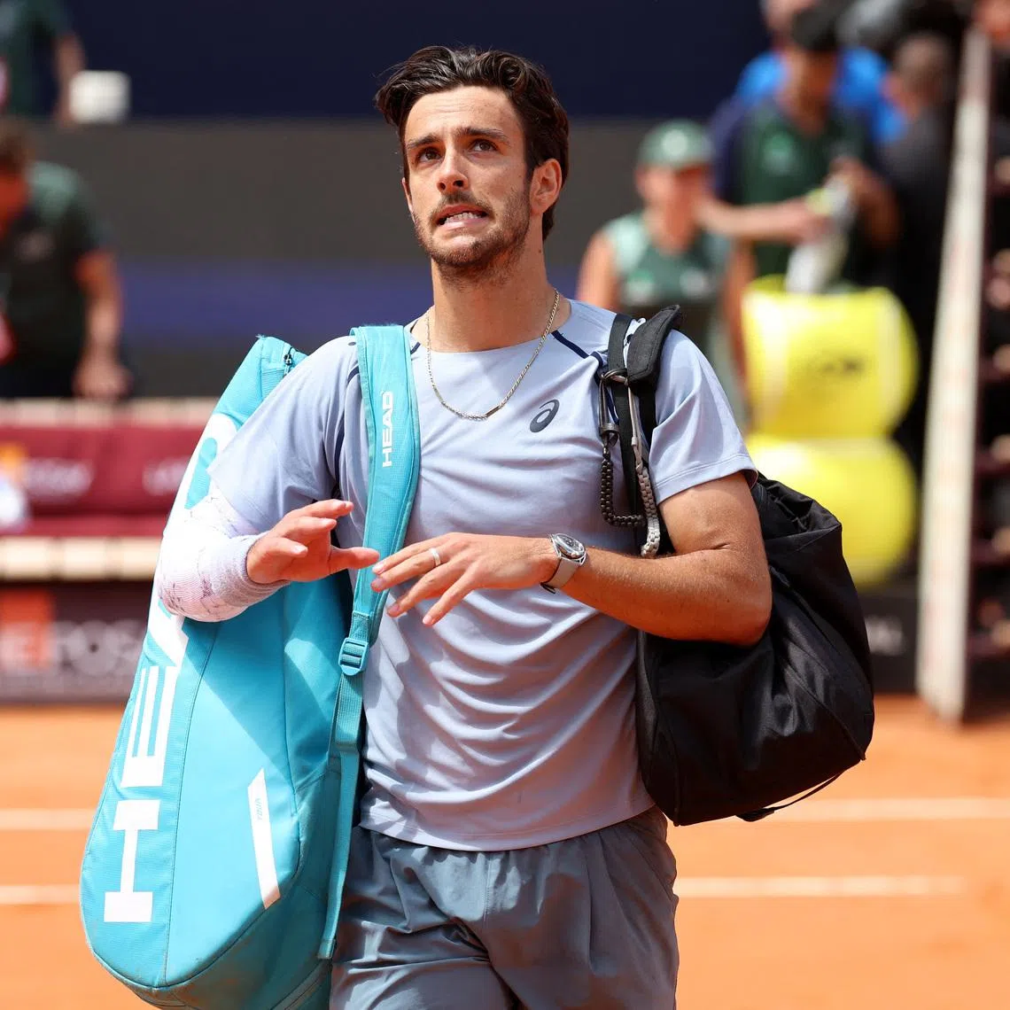 Tennis - Italian Open - Foro Italico, Rome, Italy - May 12, 2026 Italy's Lorenzo Musetti looks dejected after losing his round of 16 match against Norway's Casper Ruud REUTERS/Ciro De Luca