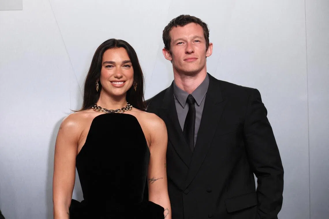 Dua Lipa and Callum Turner arriving at the Vanity Fair Oscars party after the 98th Academy Awards, in Beverly Hills, California, on March 15.