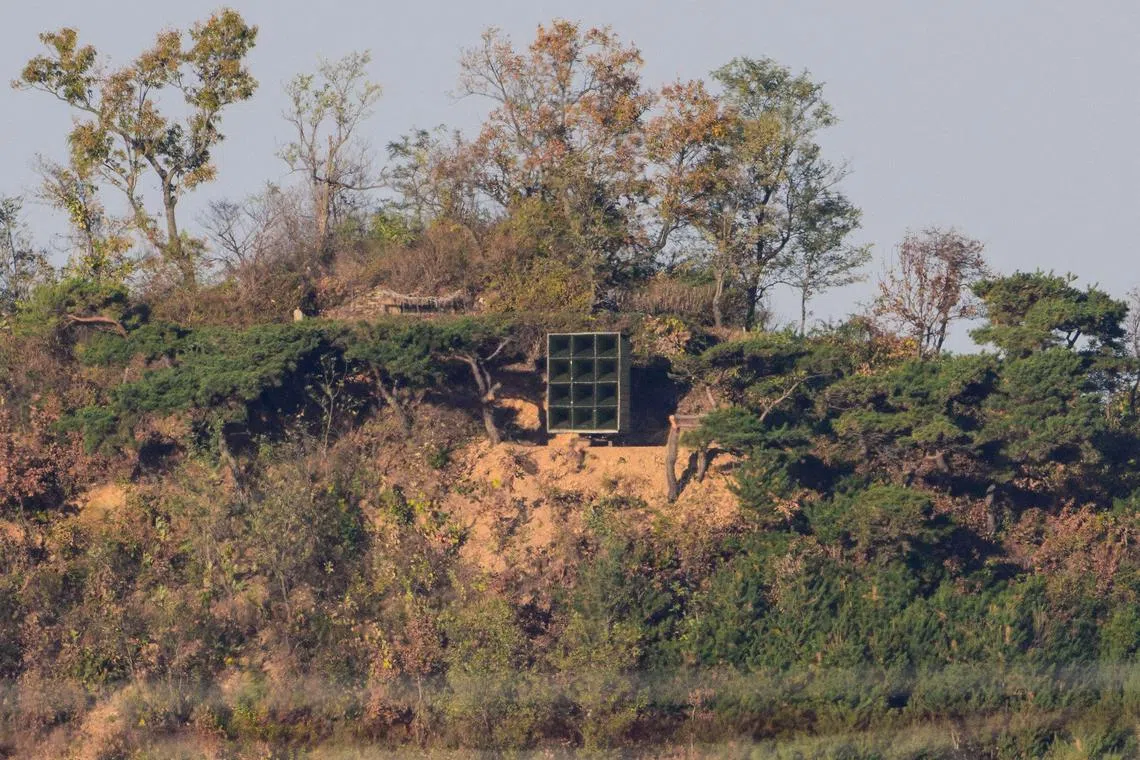 A North Korean loudspeaker is seen beyond a fence from South Korea's border island of Ganghwa.