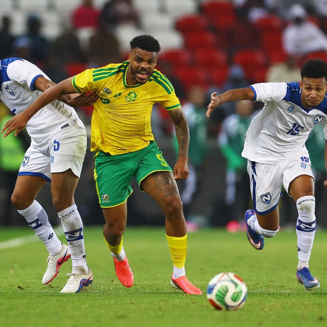 Soccer Football - International Friendly - South Africa v Nicaragua - Orlando Stadium, Soweto, South Africa - May 29, 2026 South Africa's Lyle Foster in action with Nicaragua's Justing Cano and Leyner Moses REUTERS/Siphiwe Sibeko