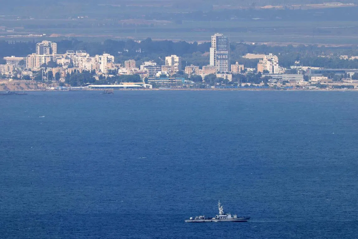A military frigate patrols off the coast of the Israeli port city of Haifa on Sept 22.