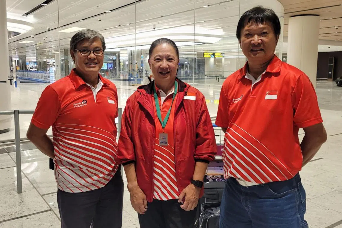 (L-R) Singapore bowls coach Bernard Foo, Bronze medalist Philomena Goh, Singapore male bowls player Anthony Loh, returning from Gold Coast, Australia after competing at the Single World Bowls Champion of Champions.