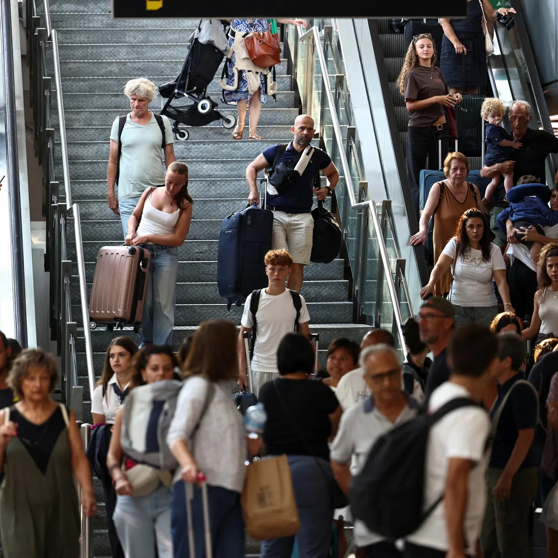 Passengers at Catania Airport following the closure of the airport due to an ash cloud from Sicily’s Mount Etna.