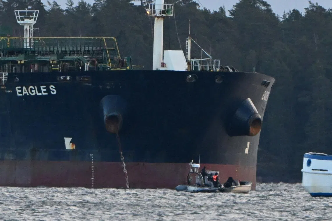 FILE PHOTO: Finnish Coast Guard stops a small boat which tried to reach the oil tanker Eagle S anchored near the Kilpilahti port in Porvoo, on the Gulf of Finland December 30, 2024.  Lehtikuva/Jussi Nukari/via REUTERS/File Photo