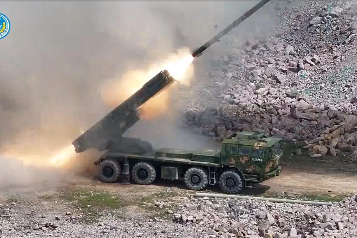 A military equipment takes part in long-range live-fire drills in waters of the East China Sea, in this screenshot from a handout video released by the Eastern Theatre Command of China's People's Liberation Army (PLA) on April 2, 2025. Eastern Theatre Command/Handout via REUTERS