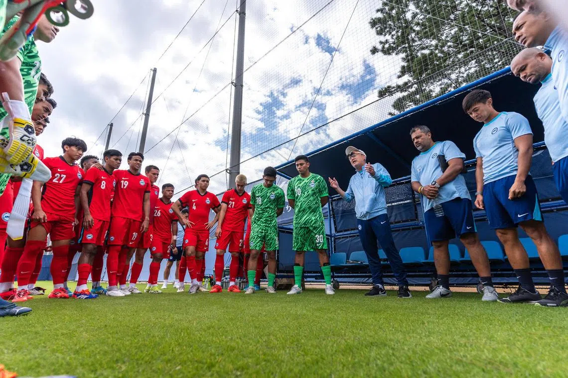 dlsoc17 - Singapore national football coach Tsutomu Ogura (in cap) addresses the Lions while on a recent training camp in Japan.

Credit: Football Association of Singapore