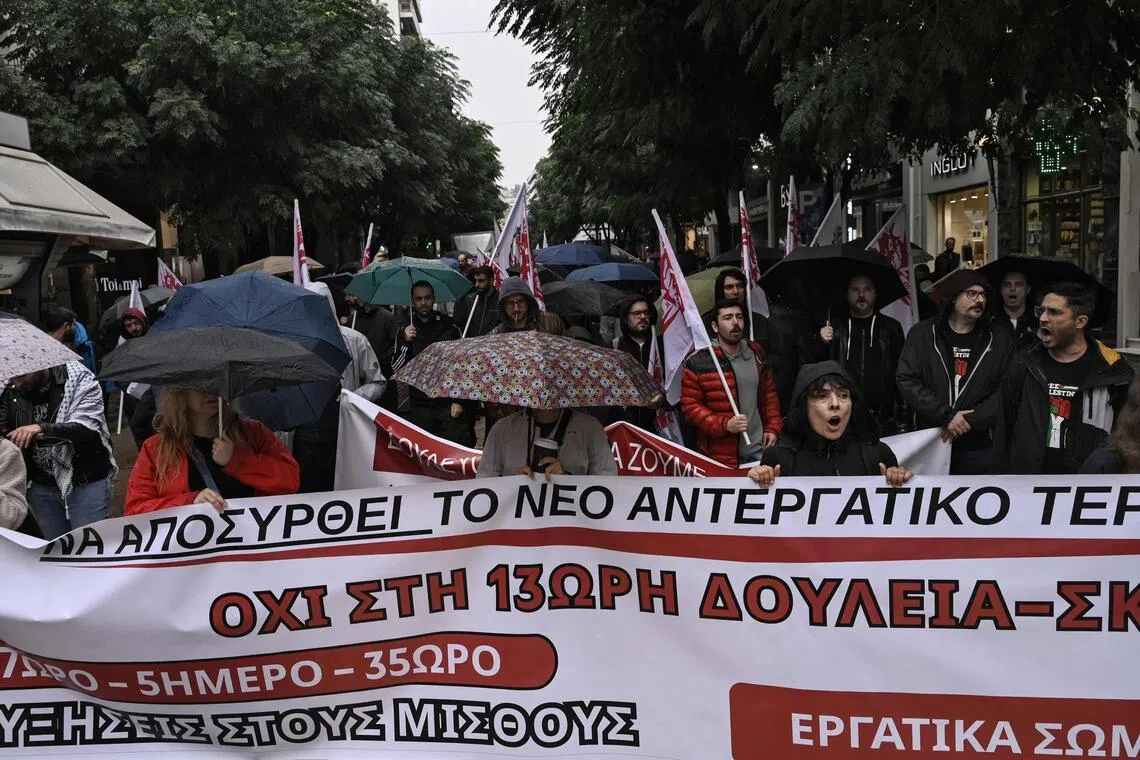 People take part in a demonstration as part of a one-day general strike in Thessaloniki on Oct 1, 2025.