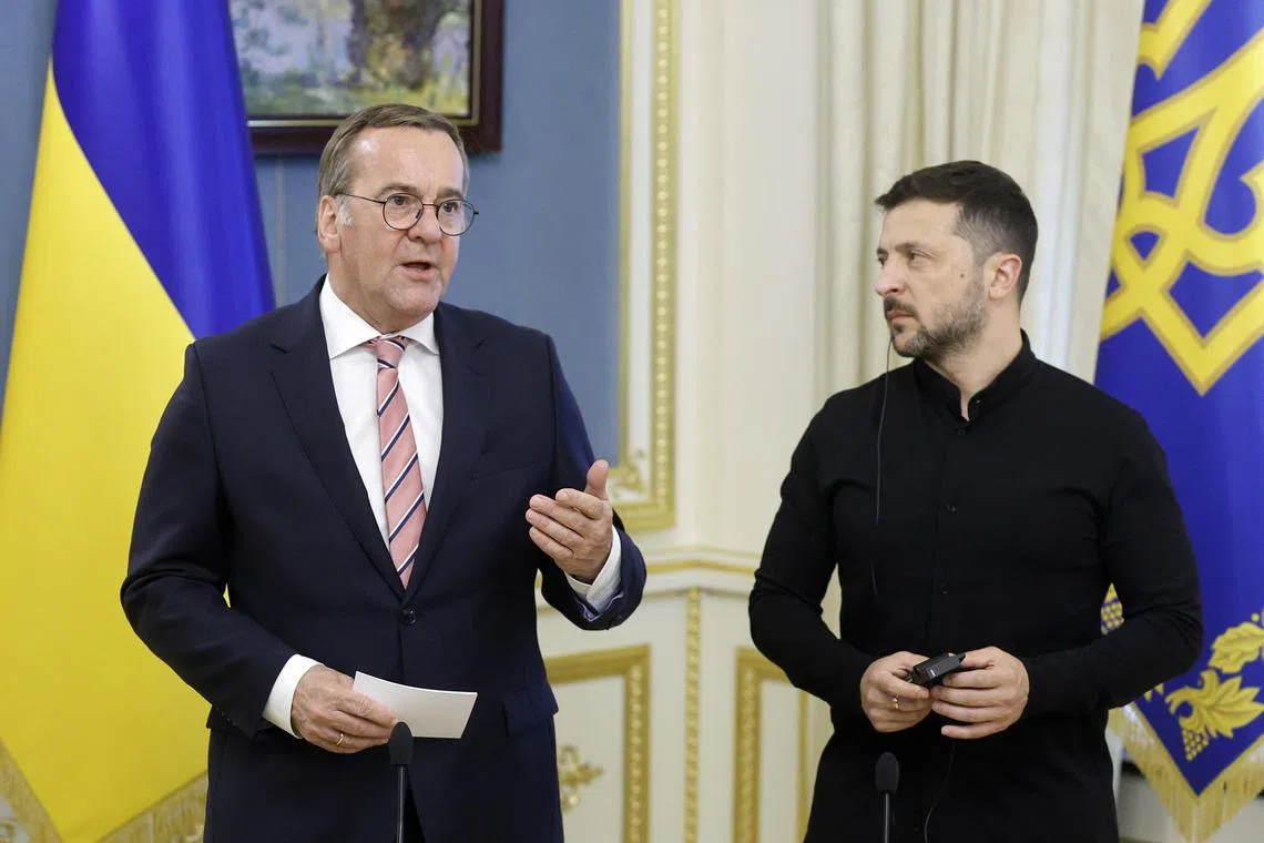 German Defence Minister Boris Pistorius (left) and Ukrainian President Volodymyr Zelensky delivering a press briefing after their meeting in Kyiv, on June 12.