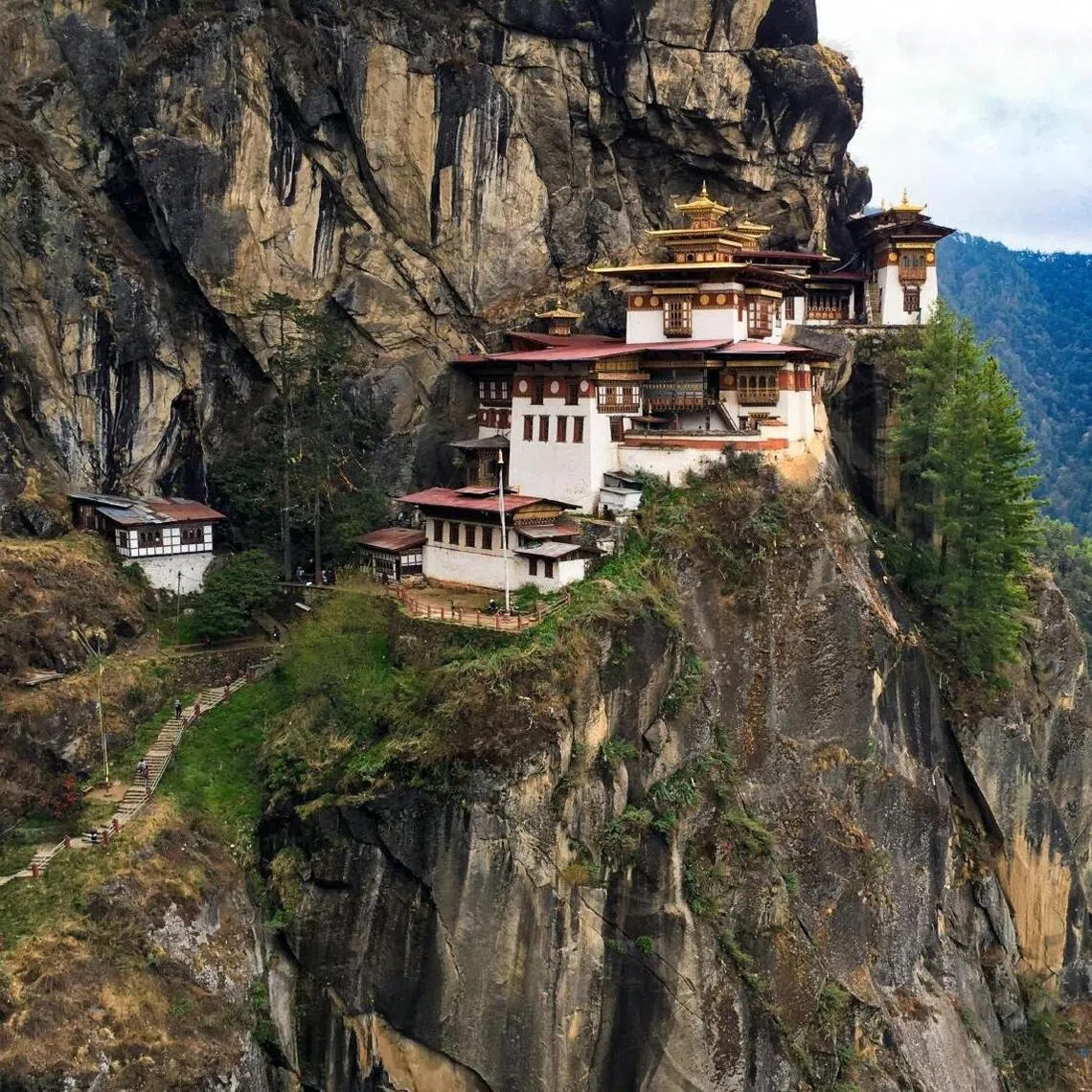 The woman was descending from Tiger’s Nest Monastery, one of Bhutan’s most sacred Buddhist sites. It sits 3,120m above sea level.