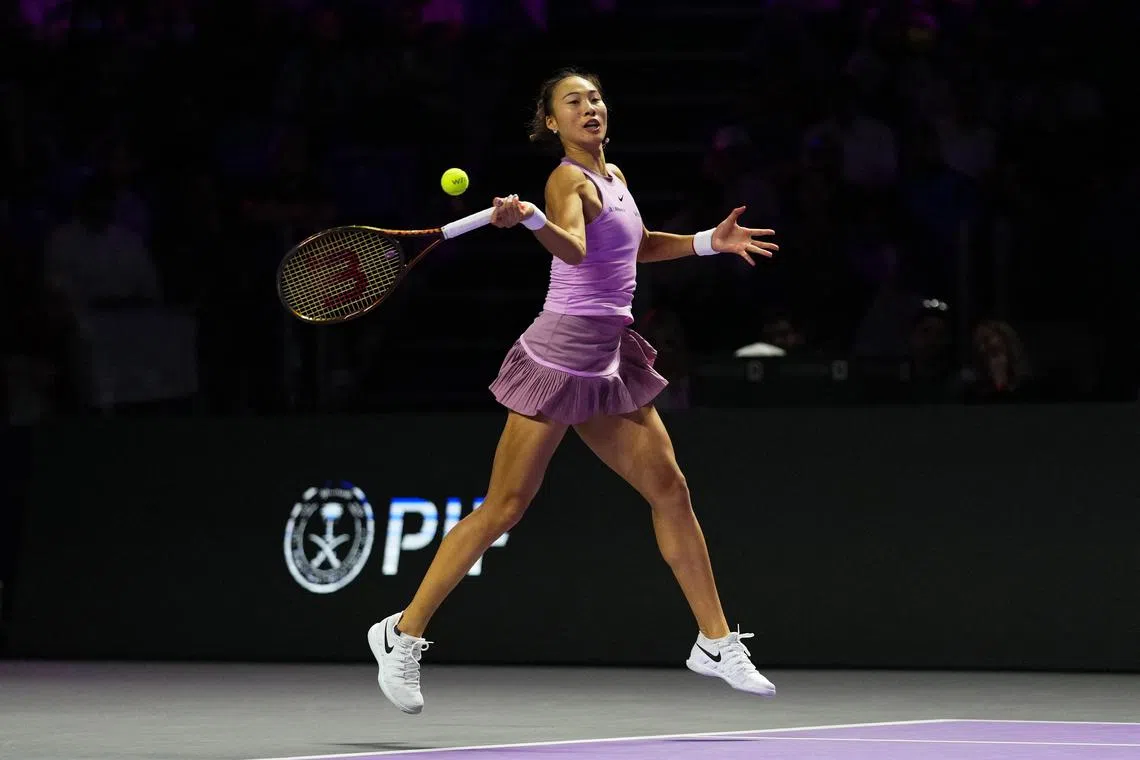 FILE PHOTO: Tennis - WTA Finals - King Saud University Indoor Arena, Riyadh, Saudi Arabia - November 9, 2024 China's Qinwen Zheng in action during the women's singles final against Coco Gauff of the U.S. REUTERS/Aleksandra Szmigiel/File Photo