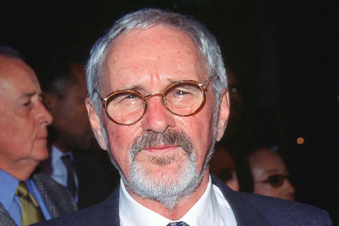 Director Norman Jewison arrives for the premiere of “The Hurricane” in Los Angeles, California, on December 14, 1999. Norman Jewison, the Oscar-nominated director of "In the Heat of the Night" and "Moonstruck" has died at the age of 97, his publicist said January 22.
The Canadian-born Jewison worked with some of Hollywood's biggest stars including Steve McQueen, Denzel Washington, Sidney Poitier and singer Cher.
Over an eclectic career he hopped among genres, helming musicals, comedies and romances, as well as films that tackle weighty social issues. (Photo by Chris DELMAS / AFP)