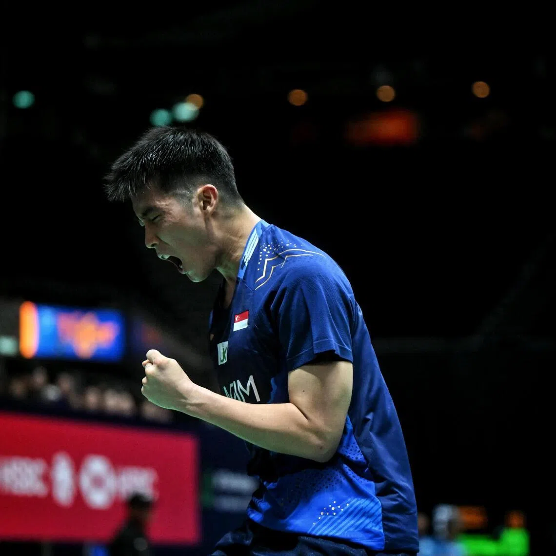Singapore's Loh Kean Yew celebrates after winning a point in his victory over India's H. S. Prannoy in the KFF Singapore Open men's singles last 16.