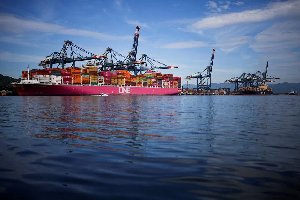 FILE PHOTO: Ships and containers are seen at the Port of Santos in Santos, Brazil April 3, 2025. REUTERS/Amanda Perobelli/File Photo