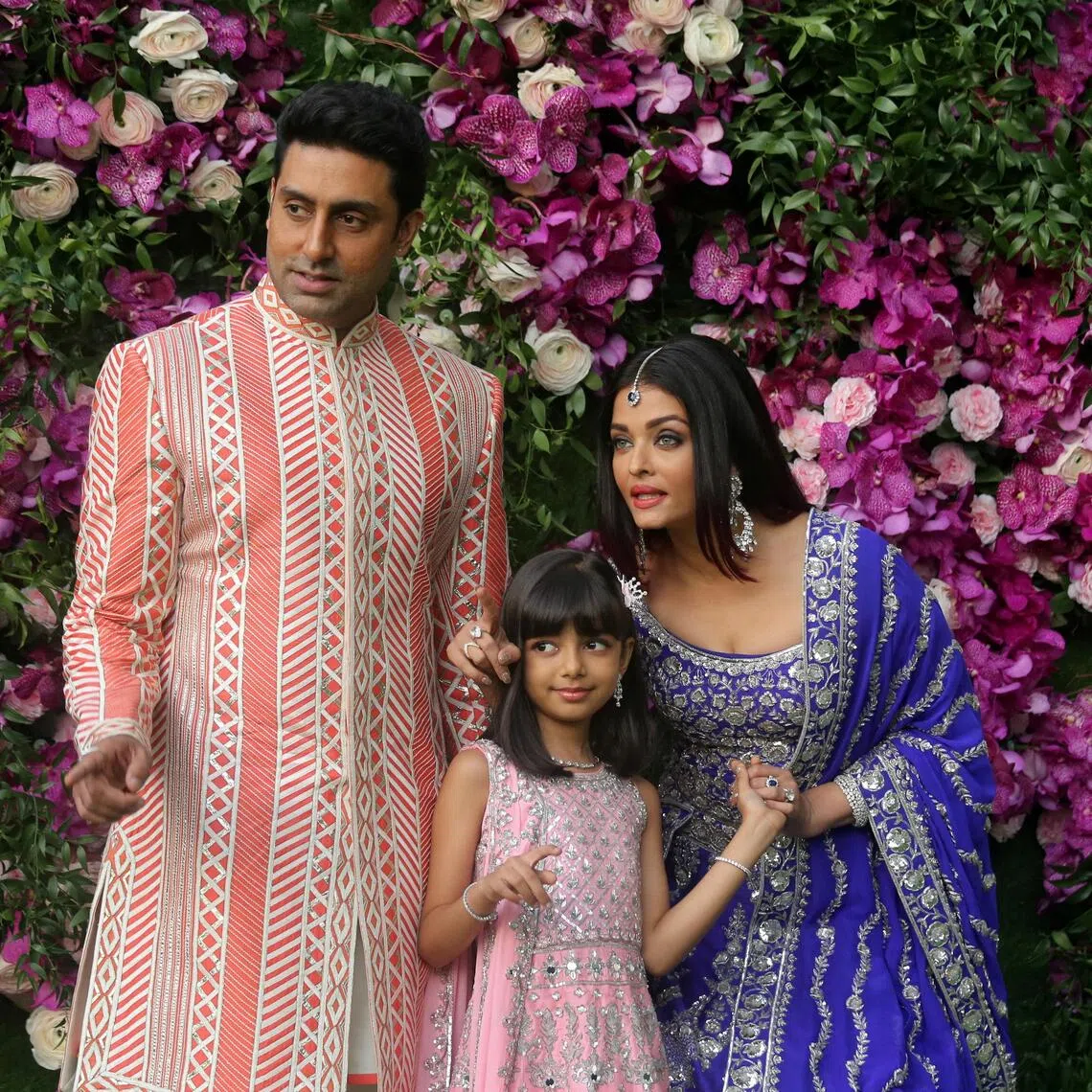 Abhishek Bachcha and his wife wife Aishwarya Rai and their daughter Aaradhya pose during a photo opportunity at the wedding ceremony of Akash Ambani, son of the Chairman of Reliance Industries Mukesh Ambani, at Bandra-Kurla Complex in Mumbai, India, March 9, 2019. REUTERS/Francis Mascarenhas/File Photo
