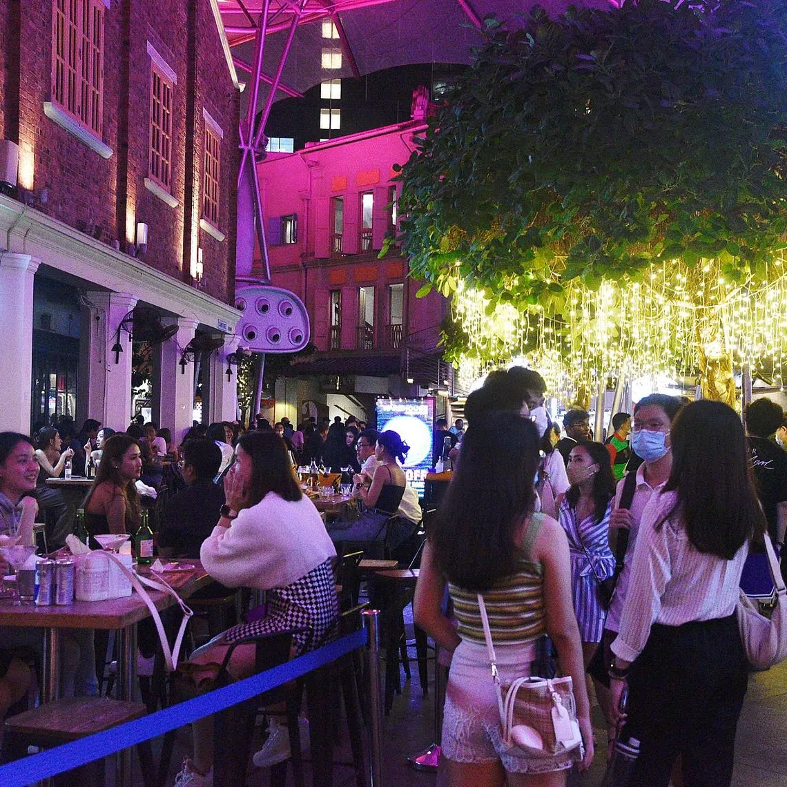 Pixgeneric / generic picture of Clarke Quay taken on 23 April 2022. Follow up on first weekend of night life reopening after 2 years. Most clubs are choosing to err on the side of caution and not open dancefloors, but other aspects of nightlife (live music venues, pubs, bars) seem to be thriving.