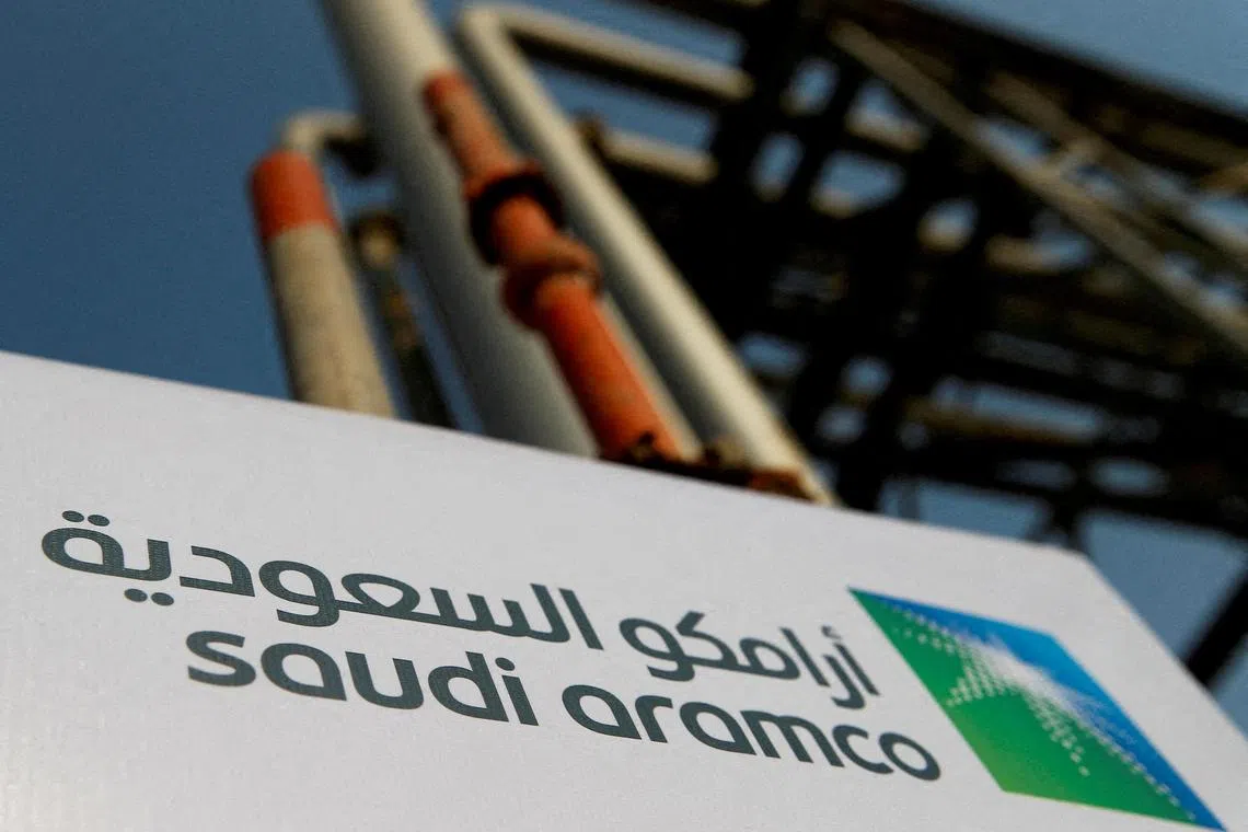 FILE PHOTO: A Saudi Aramco sign is pictured at an oil facility in Abqaiq, Saudi Arabia, October 12, 2019. REUTERS/Maxim Shemetov//File Photo