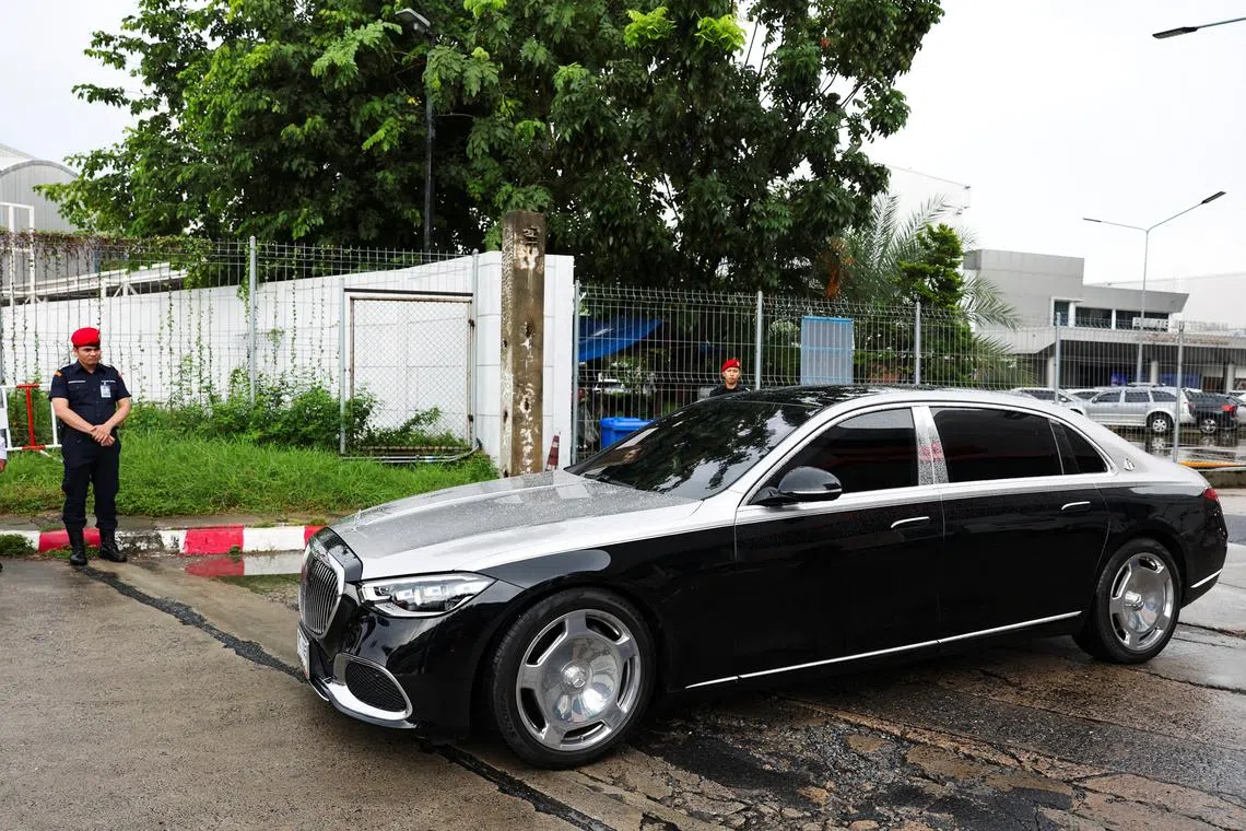 A car in the motorcade believed to be carrying Thailand's former Prime Minister Thaksin Shinawatra drives by after leaving a private jet terminal at Bangkok's Don Mueang International Airport, after he flew out of the country for what he claimed was a medical check-up in Dubai ahead of a key court case, in Bangkok, Thailand, September 8, 2025. REUTERS/Chalinee Thirasupa