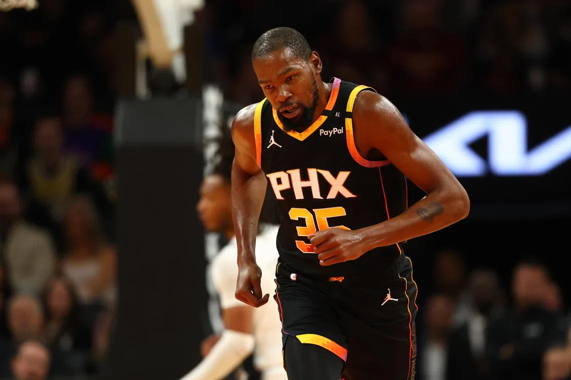 FILE PHOTO: Dec 3, 2024; Phoenix, Arizona, USA; Phoenix Suns forward Kevin Durant (35) against the San Antonio Spurs in the first half of an NBA Cup game at Footprint Center. Mandatory Credit: Mark J. Rebilas-Imagn Images/File Photo