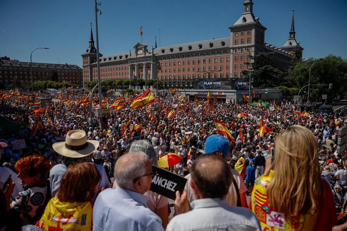 People taking part in a march to demand the resignation of PM Pedro Sanchez in Madrid, Spain, on May 23.