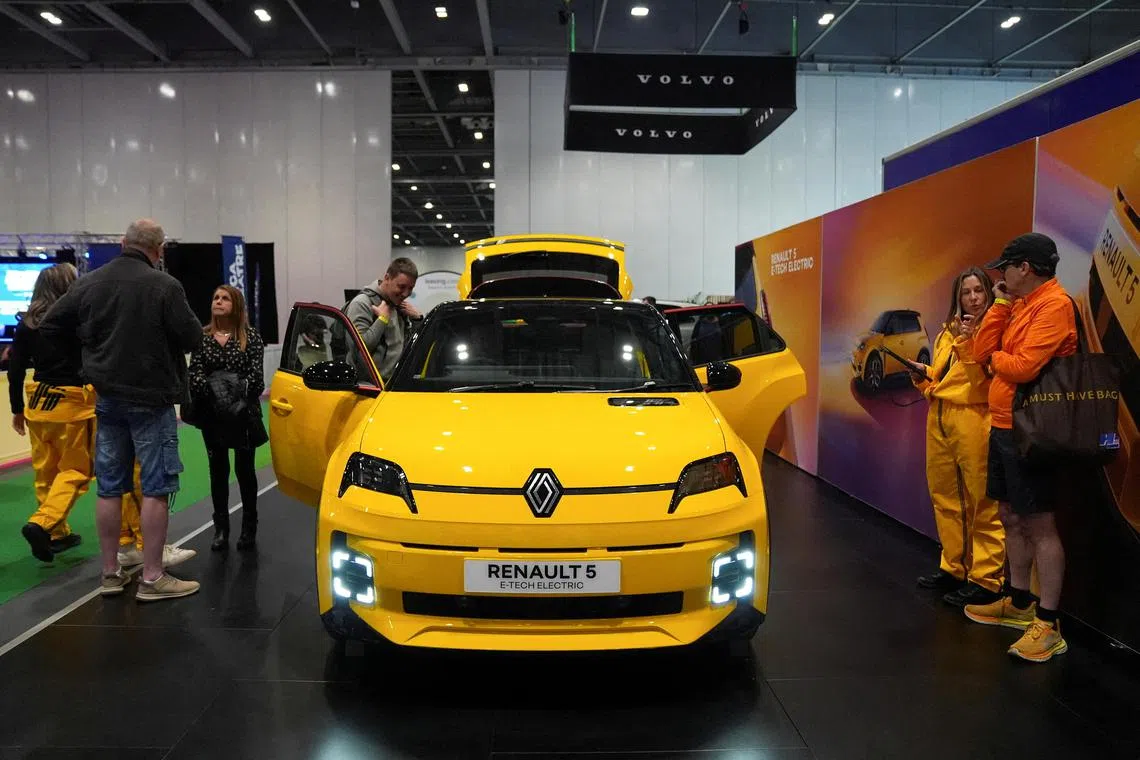 FILE PHOTO: A Renault electric car is displayed at the Everything Electric, the Home Energy & Electric Vehicle Show, in London, Britain, April 16, 2025. REUTERS/Maja Smiejkowska/File Photo