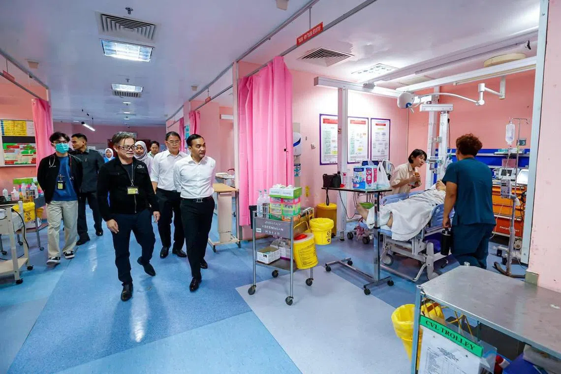 Johor Menteri Besar Onn Hafiz Ghazi (front right) during a visit to a government hospital on July 14.