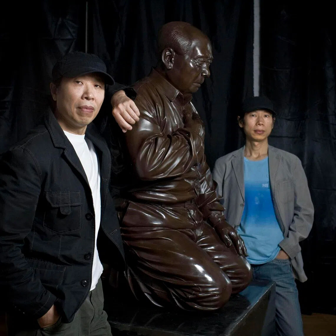 Gao Zhen (left) and his brother Gao Qiang with their artwork, titled Mao’s Guilt, in Beijing in 2009.