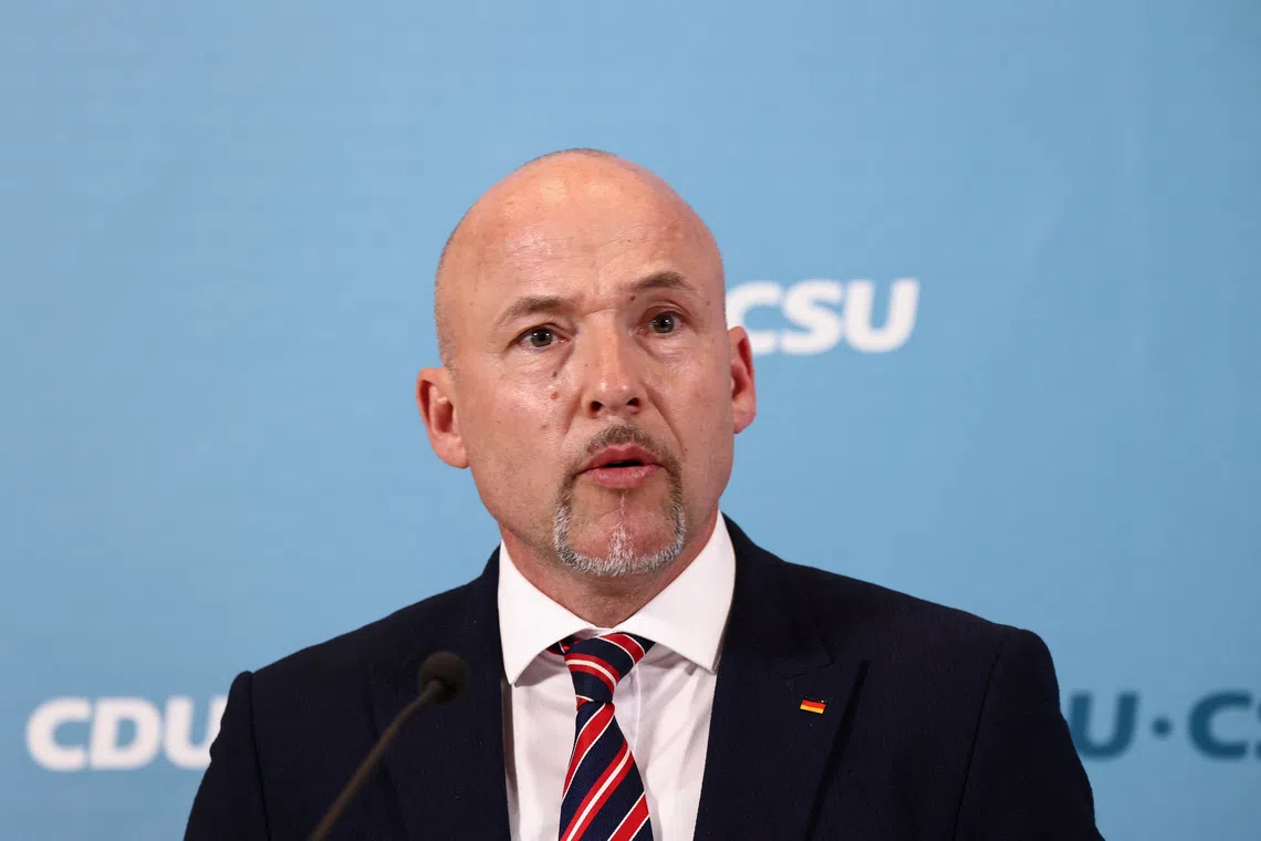 Alexander Hoffmann of CSU makes a joint statement, after being elected as one of two new chairs of the CDU/CSU Bundestag parliamentary group, in Berlin, Germany, May 5, 2025. REUTERS/Liesa Johannssen/File Photo