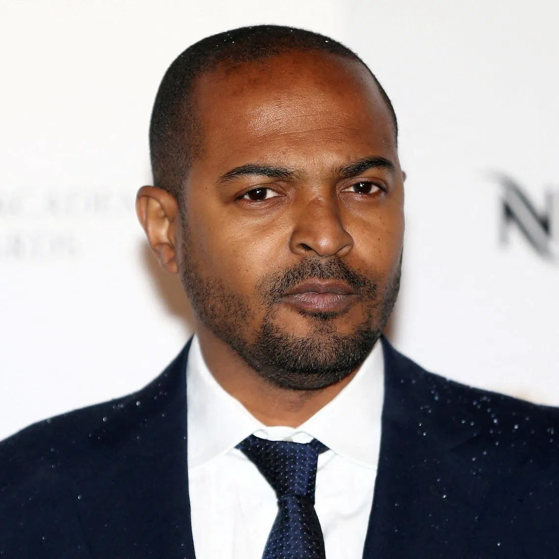 FILE PHOTO: Actor Noel Clarke poses for photographers at the British Academy Film Awards Nominees Party at Kensington Palace in London, Britain February 11, 2017. REUTERS/Neil Hall/File Photo