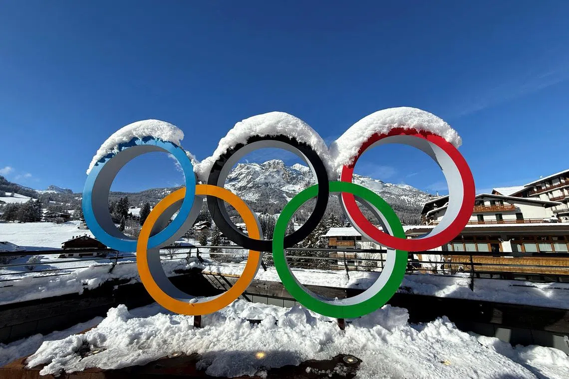 FILE PHOTO: Milano Cortina 2026 Winter Olympics - Previews - Cortina d'Ampezzo, Italy - January 26, 2026 General view of the Olympic rings covered in snow ahead of the Milano Cortina 2026 Winter Olympics REUTERS/Peter Jebautzke/File Photo