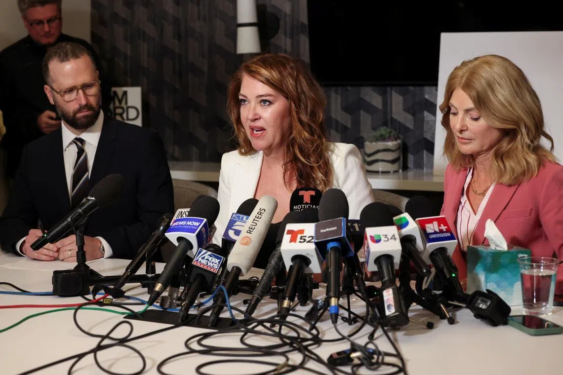 Ms Lonna Drewes (centre) speaking at a press conference in Beverly Hills, California, in April 14, where she accused US Representative Eric Swalwell of sexual misconduct.