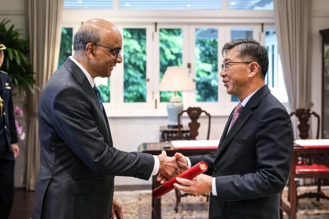 President Tharman Shanmugaratnam (left)and new chairman of the Council of Presidential Advisers Tan Chong Meng.