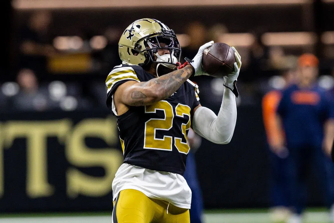 FILE PHOTO: Oct 17, 2024; New Orleans, Louisiana, USA;  New Orleans Saints cornerback Marshon Lattimore (23) during the warmups before the game against the Denver Broncos at Caesars Superdome. Mandatory Credit: Stephen Lew-Imagn Images/File Photo