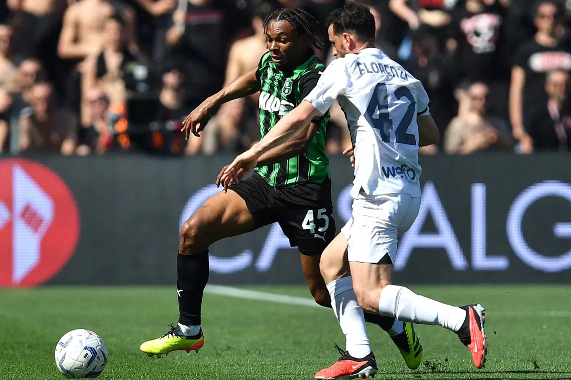 Milan held to 2-2 home draw by Sassuolo after late Lauriente equaliser