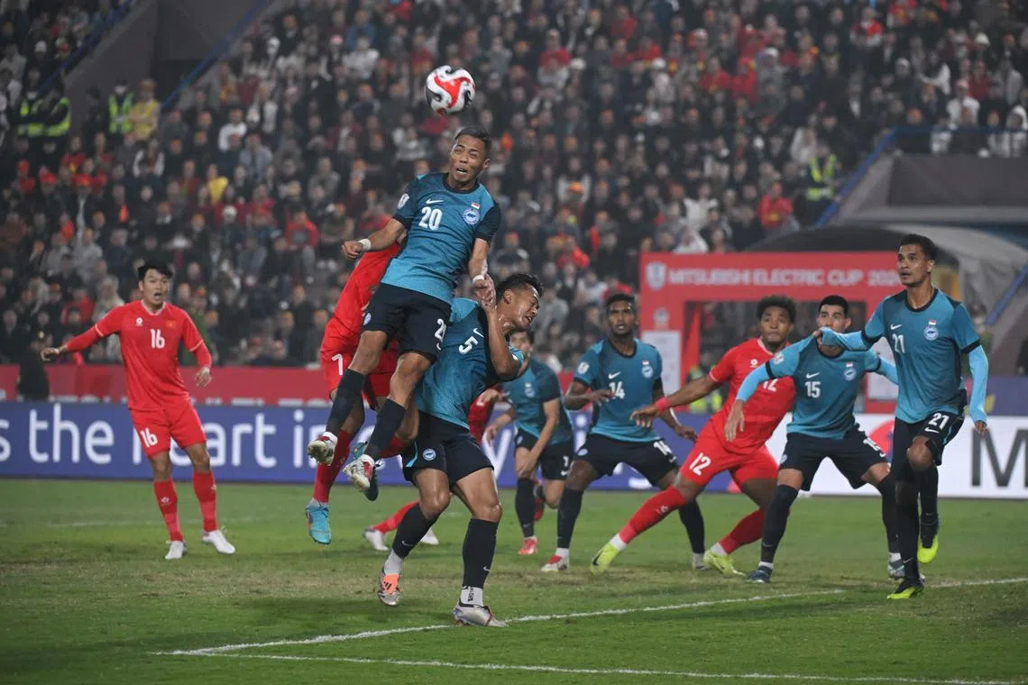 Singapore?s Shawal Anuar heads against Vietnam during the ASEAN Mitsubishi Electric Cup semi final second leg held at the Viet Tri Stadium in Phu Tho, Vietnam, on Dec 29, 2024.