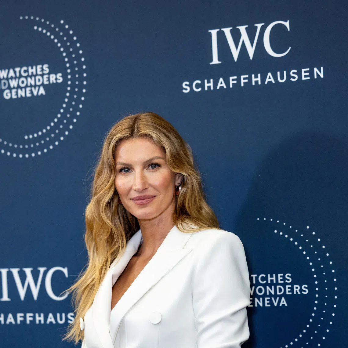 Model Gisele Bundchen poses during a photo wall session with media during the Watches and Wonders fair in Geneva, Switzerland, April 9, 2024. REUTERS/Pierre Albouy