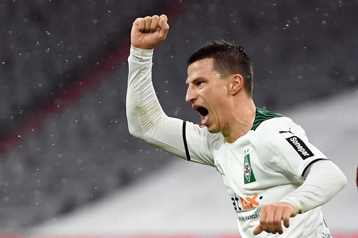 FILE PHOTO: Soccer Football - Bundesliga - Bayern Munich v Borussia Moenchengladbach - Allianz Arena, Munich, Germany - January 7, 2022 Borussia Moenchengladbach's Stefan Lainer celebrates scoring their second goal REUTERS/Andreas Gebert