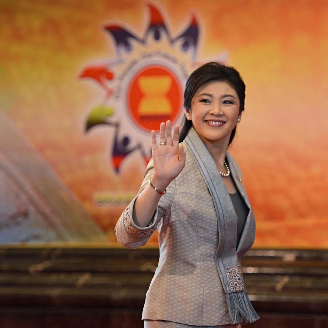 Thai Prime Minister Yingluck Shinawatra walks across the atrium of the Prime Minister's Office (PMO) Building Complex in Bandar Seri Begawan on 24 April 2013. She was in Brunei for the 22nd ASEAN Summit.