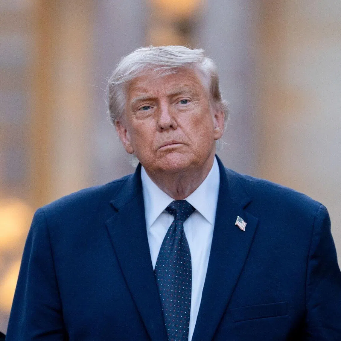 US President Donald Trump arrives for a gala dinner at the Versailles Palace in Versailles, France, on June 17.