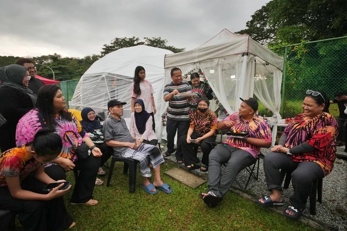 Mr Haris Husain (seated, in grey top) said his last wish is to go glamping by the sea with his family and create good memories with them.
