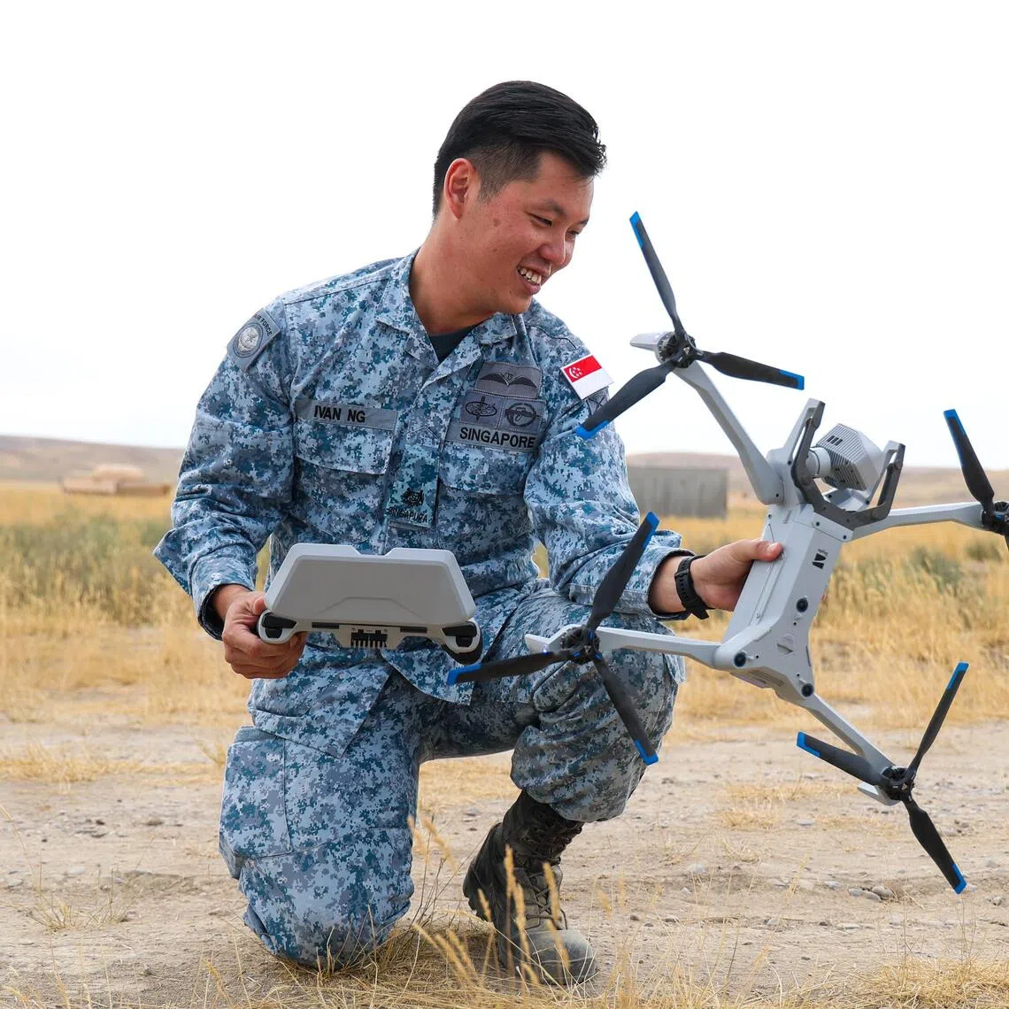 Major Ivan Ng from Singapore Armed Forces’ (SAF) new drone unit Droid with the Skydio X10 drone at Mountain Home Air Force Base in the US state of Idaho on Sept 9, 2025. Droid is participating in Exercise Forging Sabre, a biennial exercise that runs from Sept 6 to 21, for the first time.