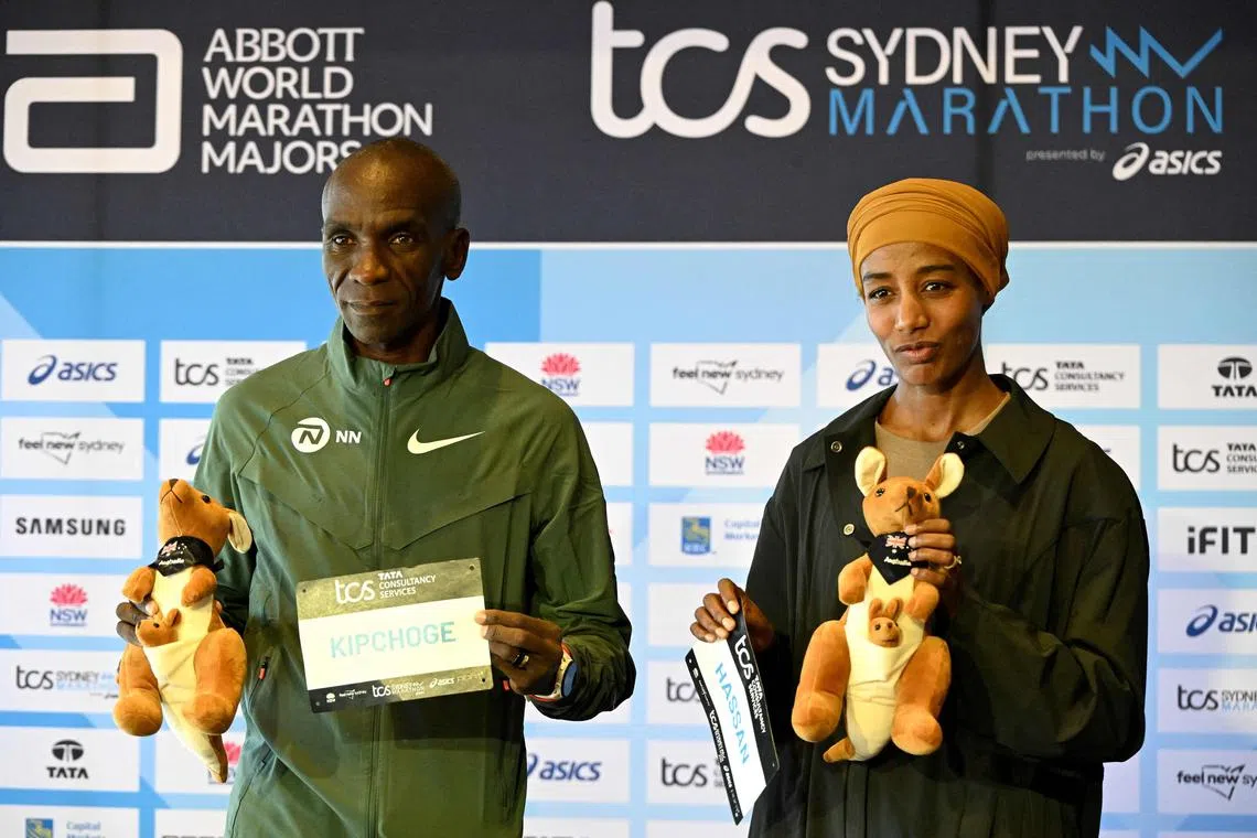 Olympic gold medallists Eliud Kipchoge (left) and Sifan Hassan will lead 35,000 runners across the Harbour Bridge on Aug 31.