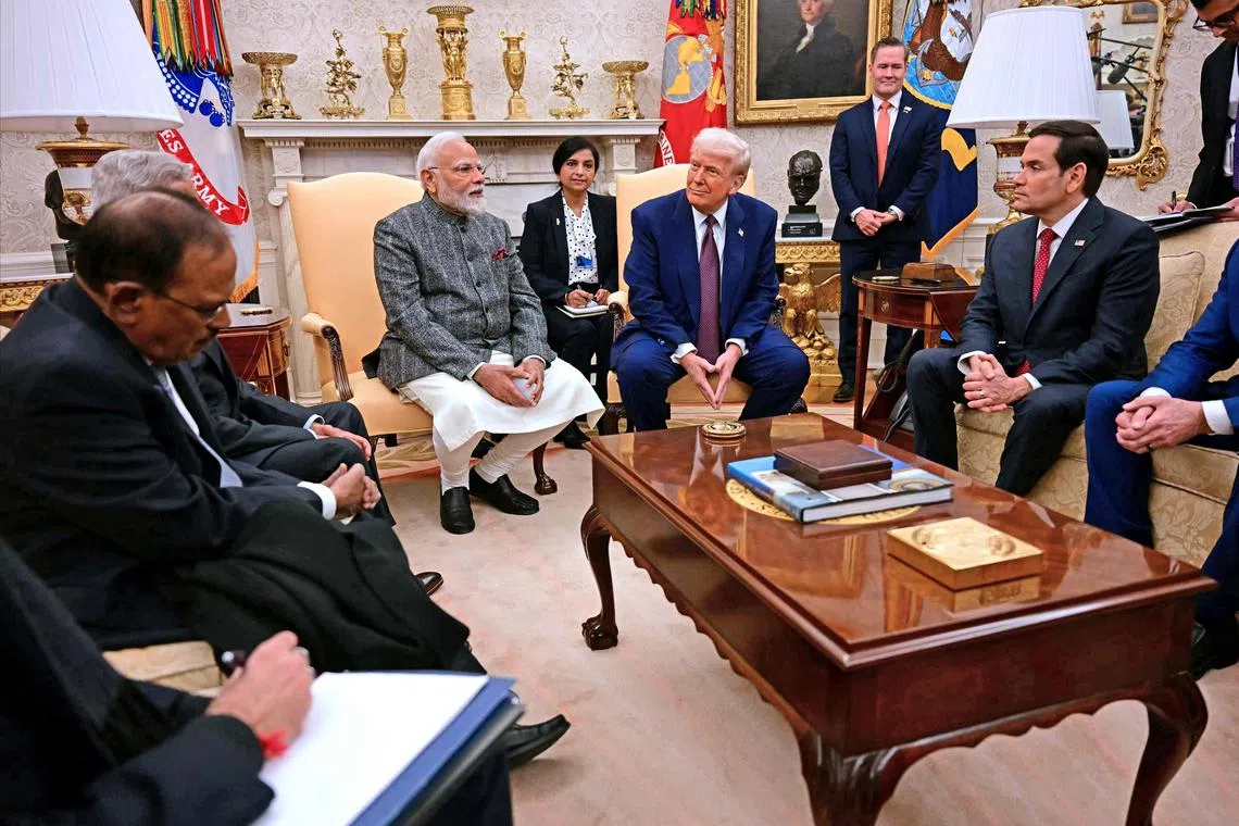 US President Donald Trump meets with Indian Prime Minister Narendra Modi in the Oval Office of the White House in Washington, DC, on February 13, 2025. (Photo by Jim WATSON / AFP)