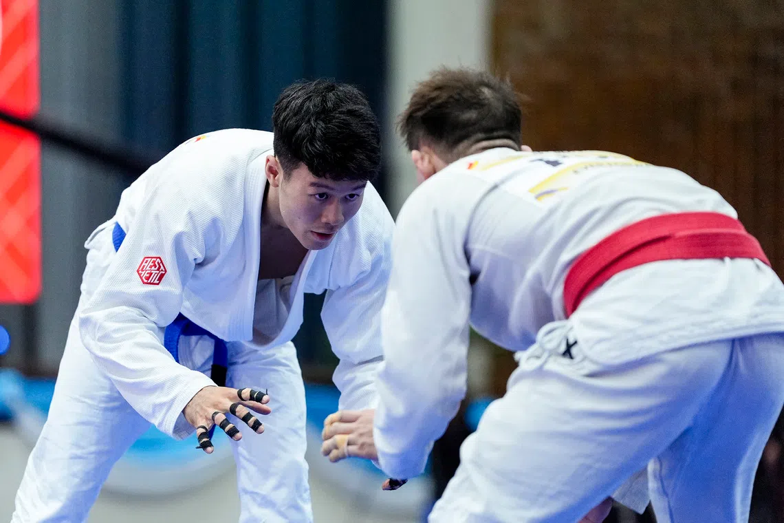 Singapore's Noah Lim in action against Marc Lim Alexander in the opening round clash on Dec 11. 
