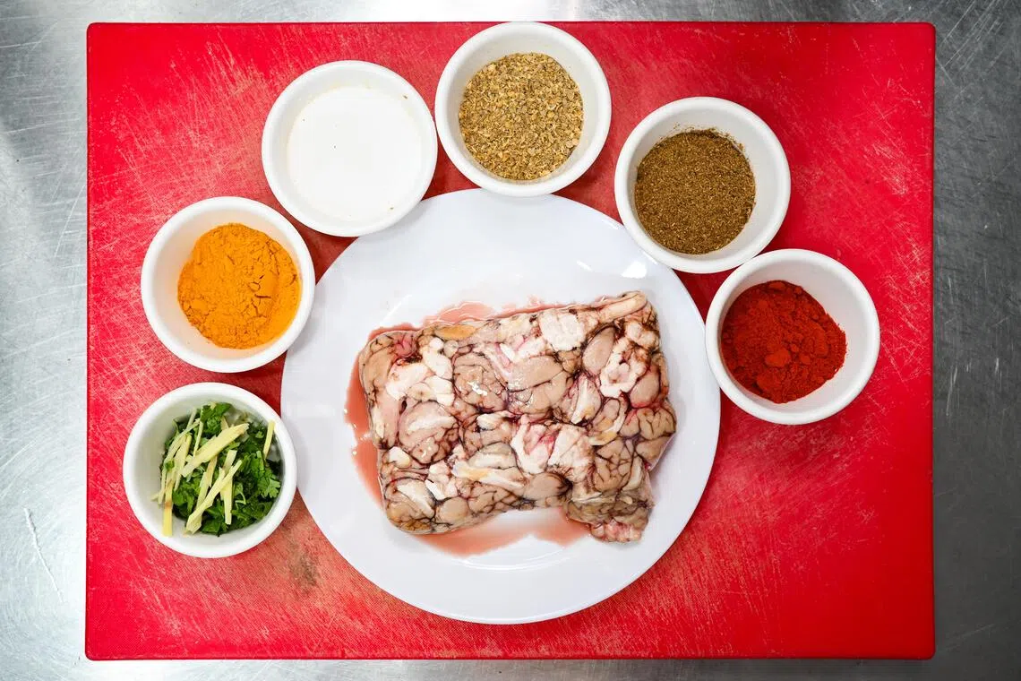 Goat brain and some of the ingredients used in brain masala at Bar B Q Tonight restaurant on Sept 3.