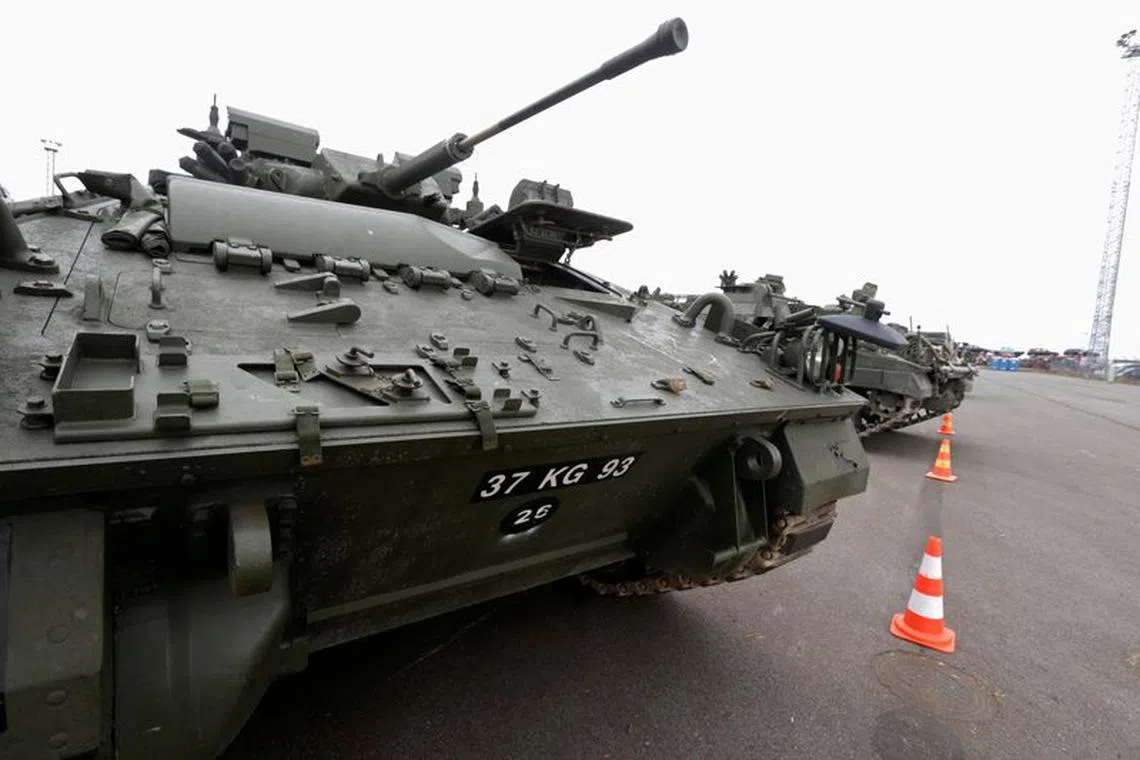 British army Warrior armoured fighting vehicles in Paldiski port, Estonia, April 5, 2017. REUTERS/Ints Kalnins/File Photo