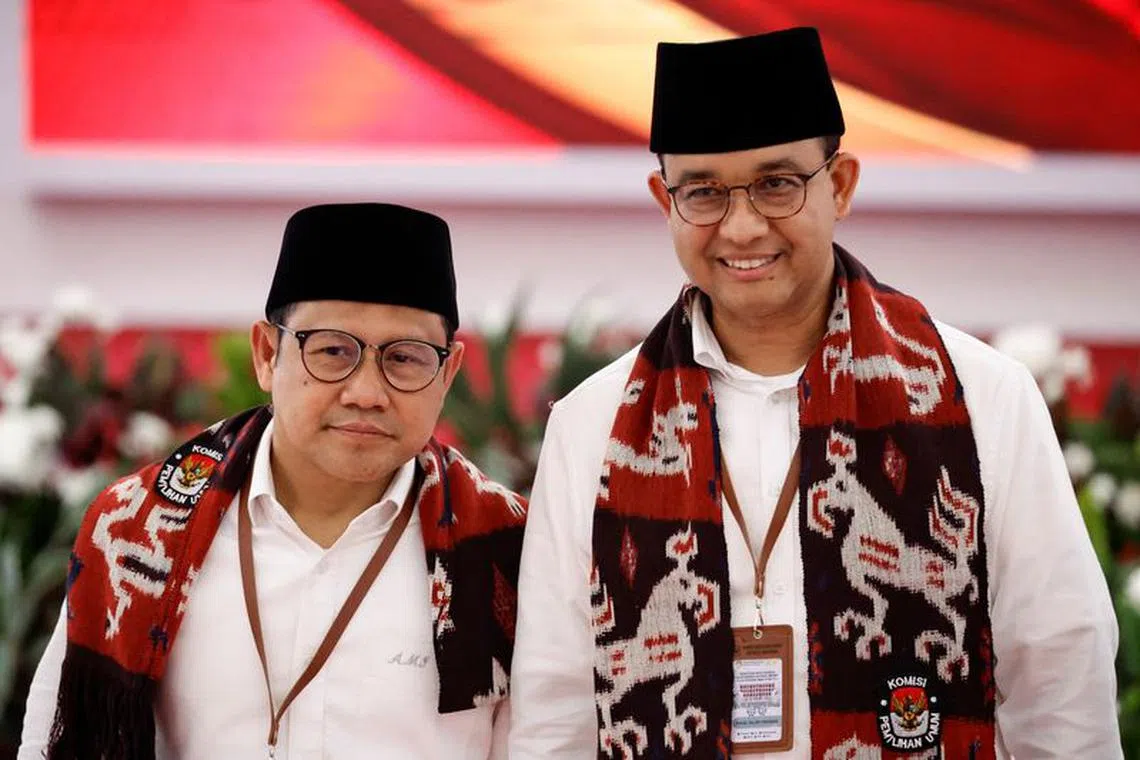 Anies Baswedan, former Jakarta Governor who will run as the presidential candidate for next year's presidential election and his running mate Muhaimin Iskandar, who is the chairman of National Awakening Party (PKB), walk as they register themselves, at the election commission headquarters in Jakarta, Indonesia, October 19, 2023. REUTERS/Willy Kurniawan