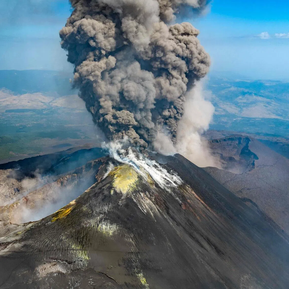A plume of ash rising from Mount Etna during an eruption on July 30.