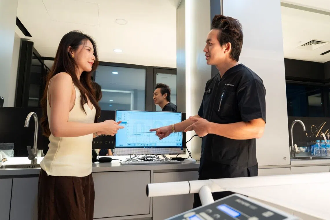 Patients at Artisan Regenerative Centre undergo a medical assessment before their whole-body hyperthermia, heat therapy, body recovery session.