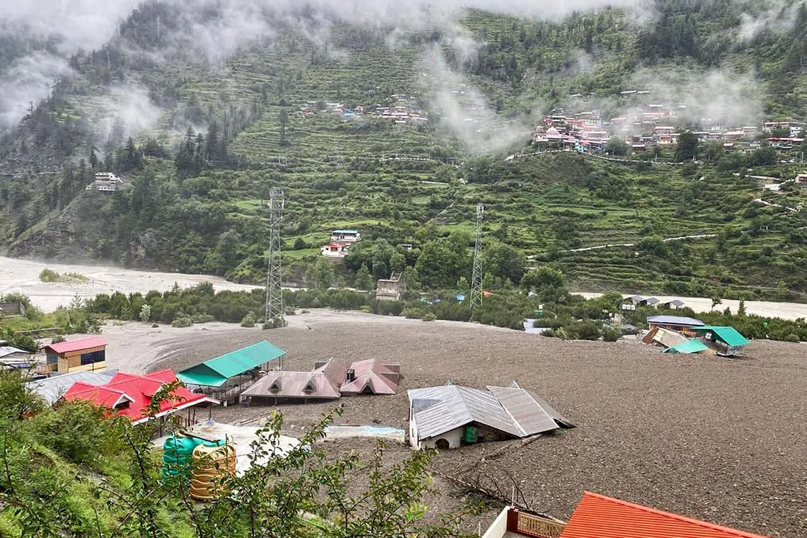 In places, the mud lapped at the rooftops of houses.